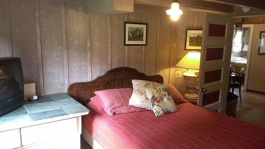 Slaapkamer in een huisje in het Hotel Volcano Hale Volcanoe