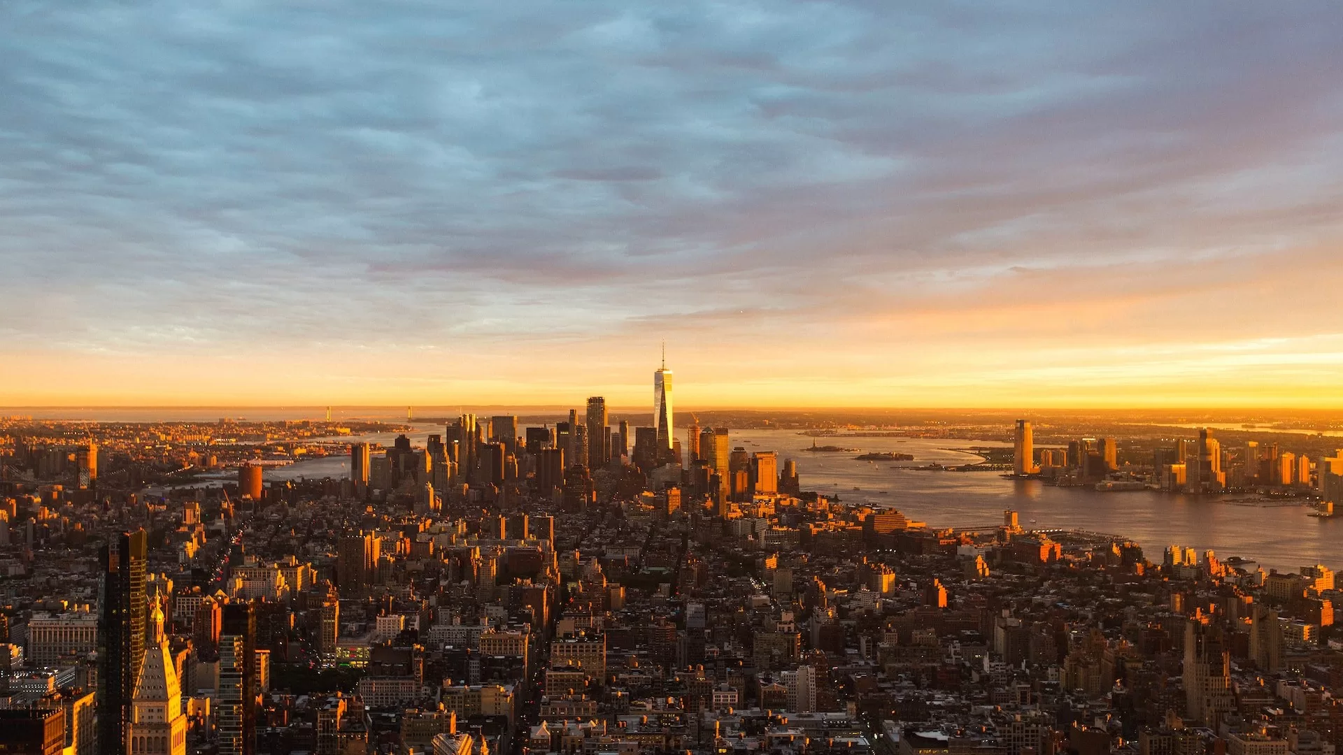 Uitzicht over Manhattan en de Hudson River bij zonsondergang