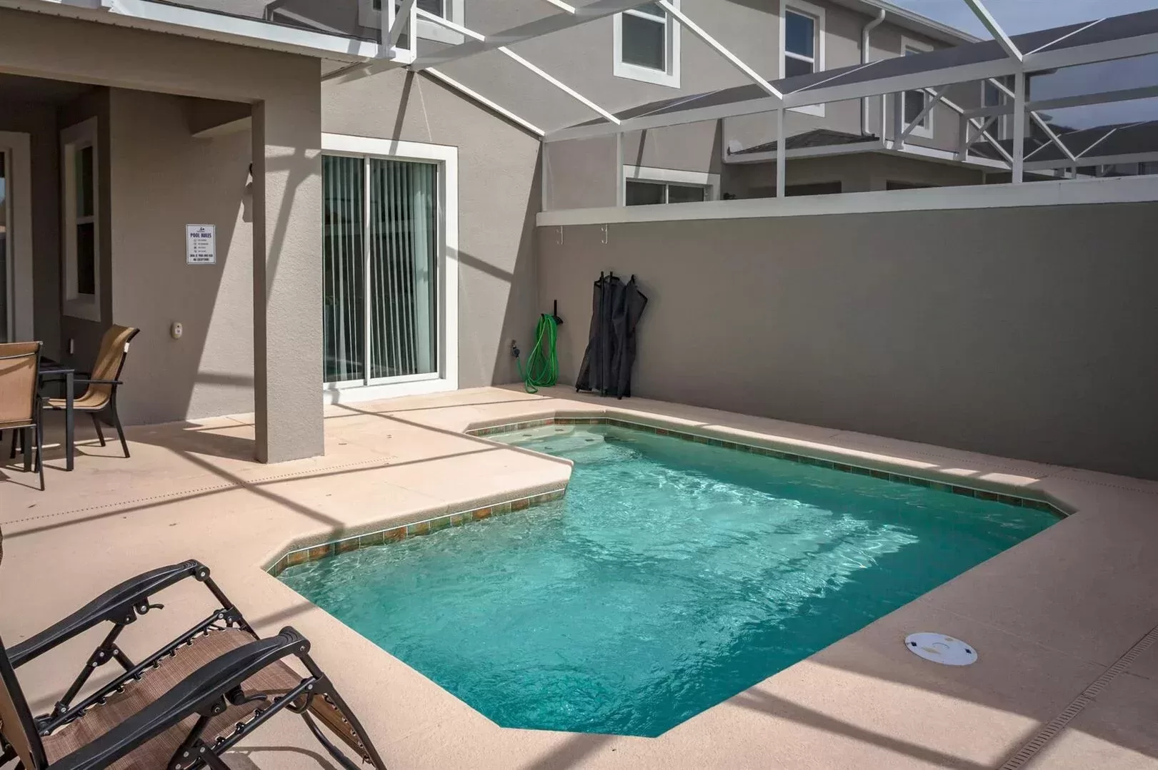 Een splashpool bij een townhome in Champions Gate, Orlando